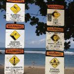 Beach safety signs at Ke'e Beach, Kauai