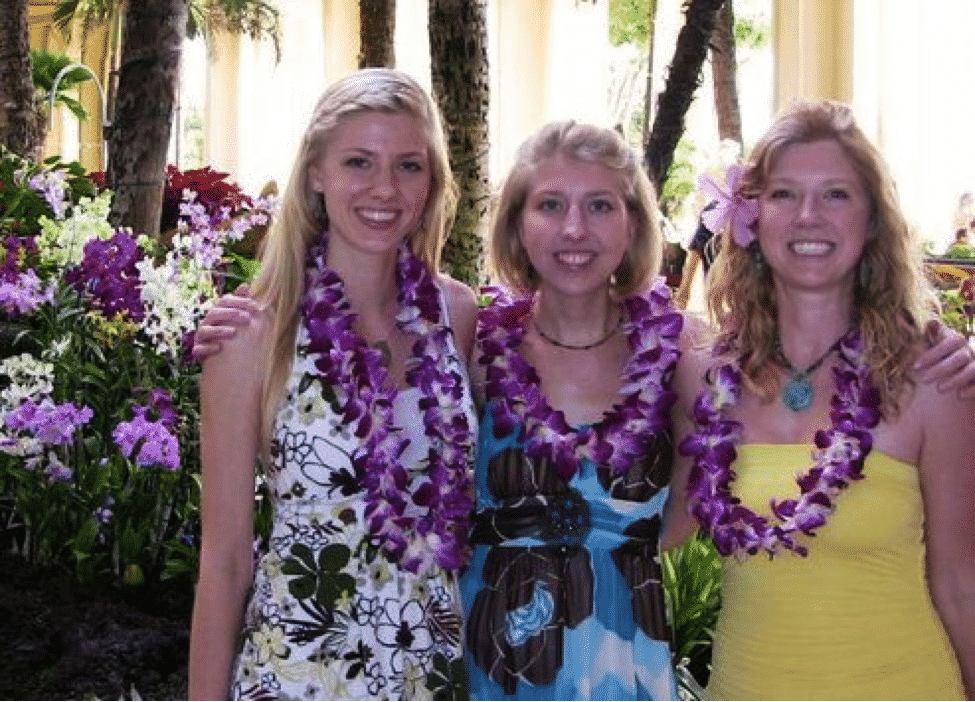 Alicia and her sisters inside the Grand Wailea where lavish Hawaiian flowers fill the common areas.