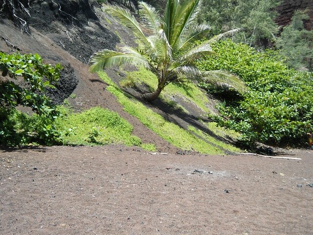 The red sand of Kaihalulu Beach